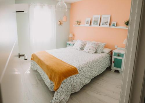Ένα ή περισσότερα κρεβάτια σε δωμάτιο στο Apartamento natural 2 dormitorios y garaje