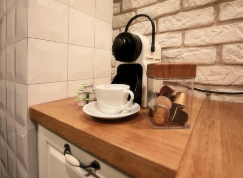 Kuchyň nebo kuchyňský kout v ubytování Old Town Apartment