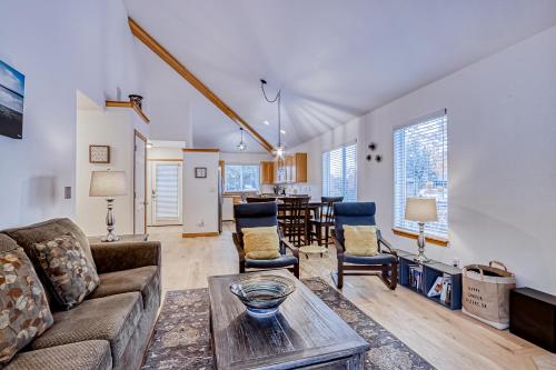 a living room with a couch and a table at Golden Pheasant Retreat in Redmond