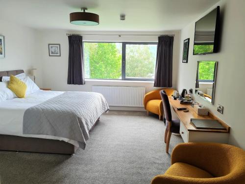 Katil atau katil-katil dalam bilik di Camden Lodge B&B and Cottage Brecon