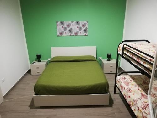 Säng eller sängar i ett rum på Casa Solferino