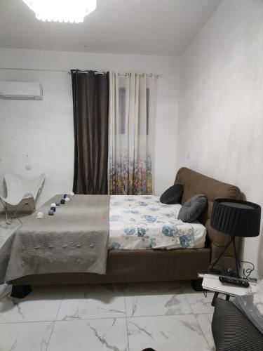Postel nebo postele na pokoji v ubytování Pinella Springs sweet house