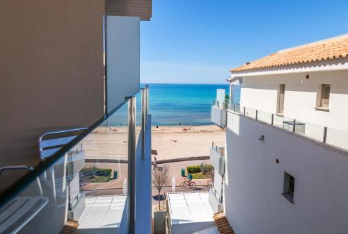a balcony with a view of the beach at Hotel Eden Palma Playa Adults Only in Can Pastilla