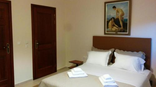 Katil atau katil-katil dalam bilik di Beautiful cozy house in the Greek Riviera