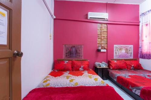 Voodi või voodid majutusasutuse SPOT ON 90156 Bidara Guest House toas