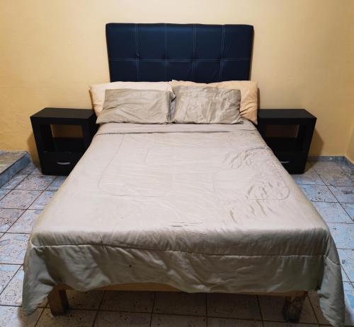 Postel nebo postele na pokoji v ubytování Hotel Diaz