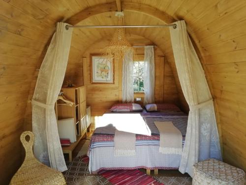 A bed or beds in a room at CASA LUCERTOLA