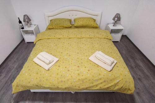 Un pat sau paturi într-o cameră la Apartmani Hani