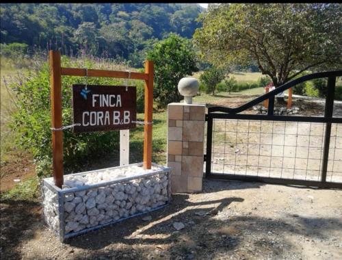 a gate with a sign that reads final coral bbb at Casa Cora Bed and Breakfast in Colonia Carmona