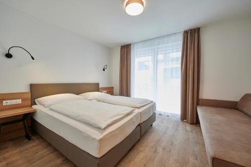 Katil atau katil-katil dalam bilik di Appartement Christina
