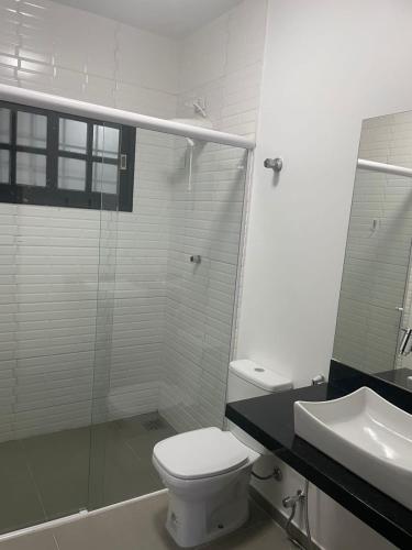 Koupelna v ubytování Linda casa com jacuzzi no coração de ponta negra
