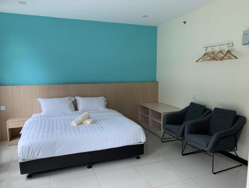 Cama o camas de una habitación en M Quality Hotel