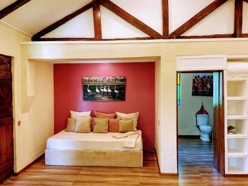 Ein Bett oder Betten in einem Zimmer der Unterkunft Pink Flamingo Boutique Hotel