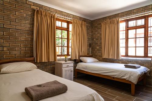 Giường trong phòng chung tại De Hollandsche Molen