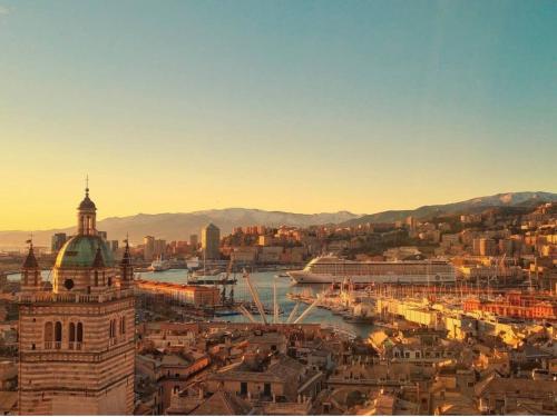a view of a city with a harbor at New Apartament in front of Genoa Cathedral in Genova