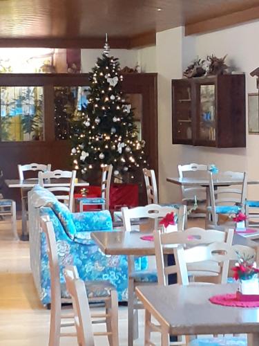 Reštaurácia alebo iné gastronomické zariadenie v ubytovaní Casa Neve e Sole - presso Sussy Residence