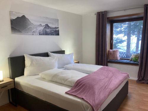 Posteľ alebo postele v izbe v ubytovaní Bären Appartements
