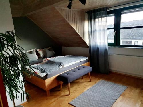 En eller flere senge i et værelse på Fewo Eifelhöhe
