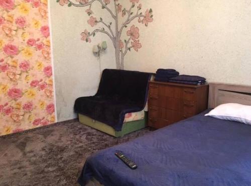 Apartment on Karachaevskayaにあるベッド