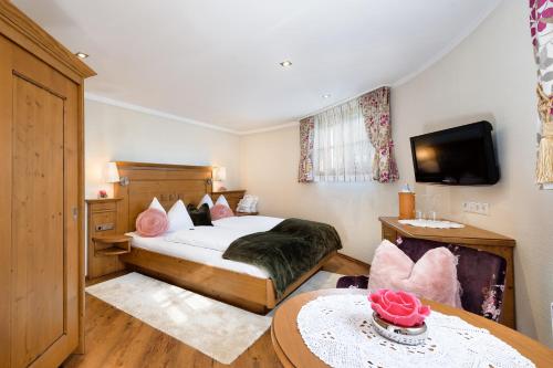 Ein Bett oder Betten in einem Zimmer der Unterkunft Chalet mySchlössl