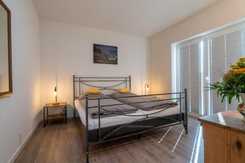 Postel nebo postele na pokoji v ubytování Das Rote Haus - Hohnemichels