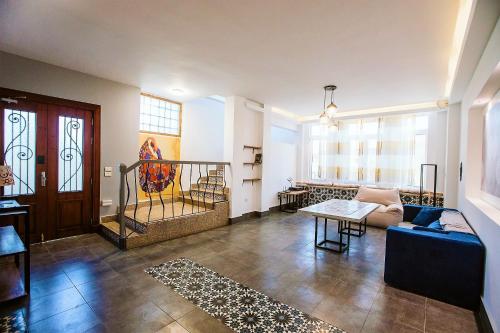 a living room with a couch and a table at Egyptian Style 5 STAR Villa for Friends and Family Gatherings in 6th Of October