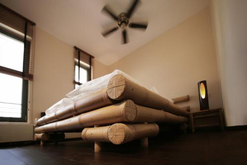 a pile ofaments sitting in a room with a ceiling at Vinotel Augustin in Sulzfeld am Main
