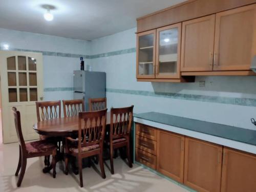 Kuchyň nebo kuchyňský kout v ubytování NH Homestay Sibu