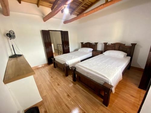 Krevet ili kreveti u jedinici u objektu Casa rústica con terraza, en el corazón del pueblo
