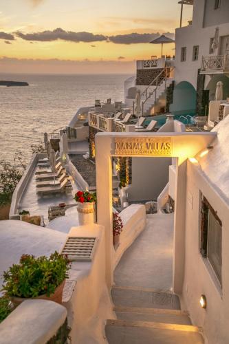 a view of the ocean from the balcony of a hotel at Oia Mare Villas in Oia