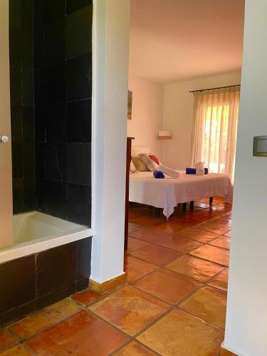 Ένα ή περισσότερα κρεβάτια σε δωμάτιο στο Casa Pepa con Encanto