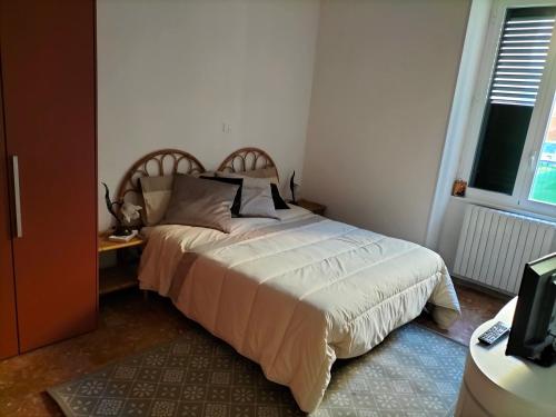 Posteľ alebo postele v izbe v ubytovaní Casetta albalè