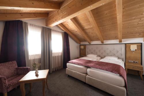 Postel nebo postele na pokoji v ubytování Hotel Seespitz