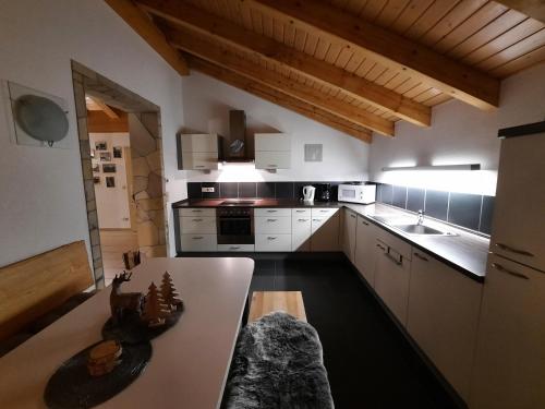 Η κουζίνα ή μικρή κουζίνα στο APARTMENT PRIVAT LUNA - Vysoké Tatry