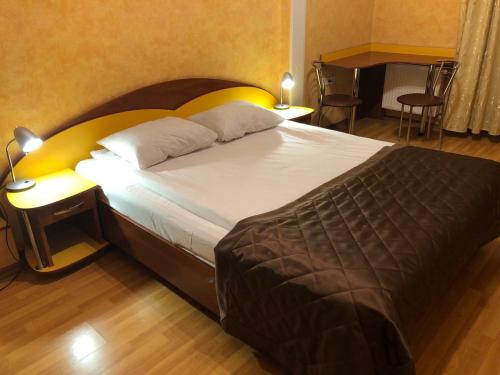Postel nebo postele na pokoji v ubytování Comfort Hotel