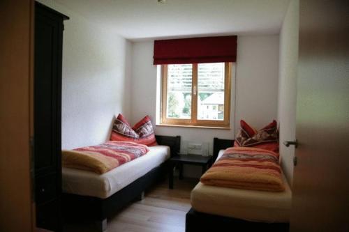 Posteľ alebo postele v izbe v ubytovaní Haus Kanisblick Appartements