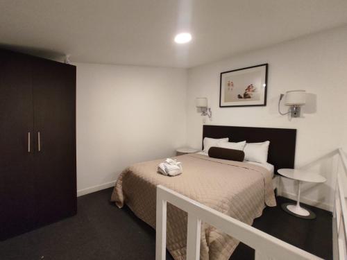 Postel nebo postele na pokoji v ubytování Apartahotel Altos de la Sabana