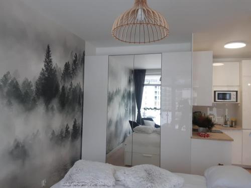 Kuchyňa alebo kuchynka v ubytovaní Apartamenty pod Dębowcem Apartament 44 Rowerek