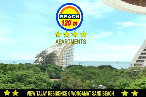 a sign for the beach at the resort at View Talay Residence 6 Wongamat Sand Beach in North Pattaya