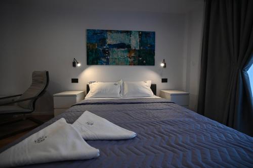 Postel nebo postele na pokoji v ubytování R&B Apartments