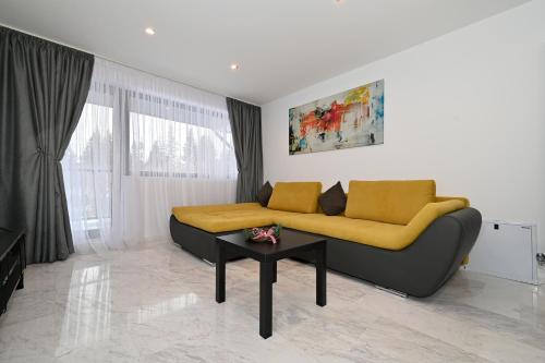 Posezení v ubytování R&B Apartments