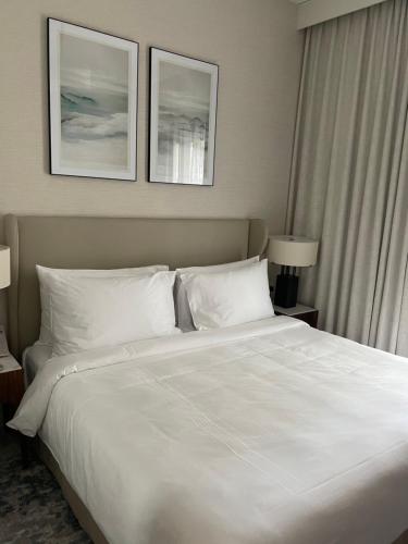 Postel nebo postele na pokoji v ubytování Address Beach Resort Residence Fujairah