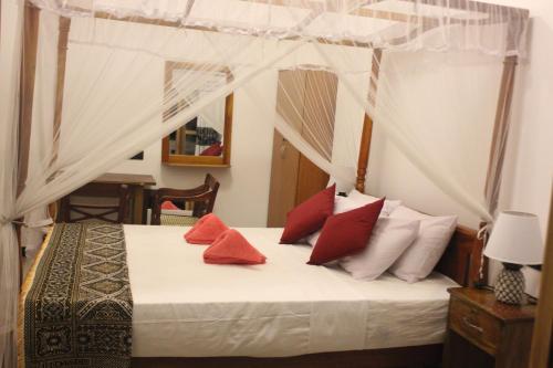 Postel nebo postele na pokoji v ubytování Brown Birds Villa