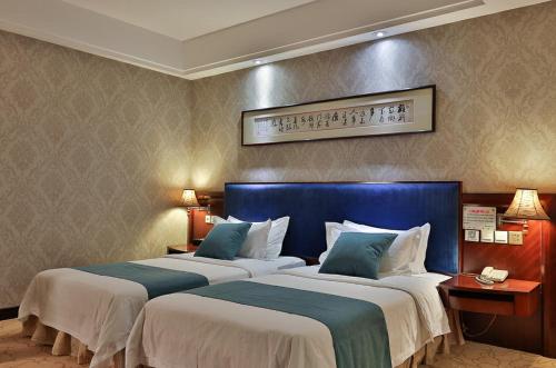 Cama o camas de una habitación en Shunde Grand View Hotel