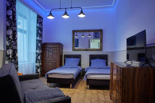 Coin salon dans l'établissement Stylish Apartment Kraków - Old Town