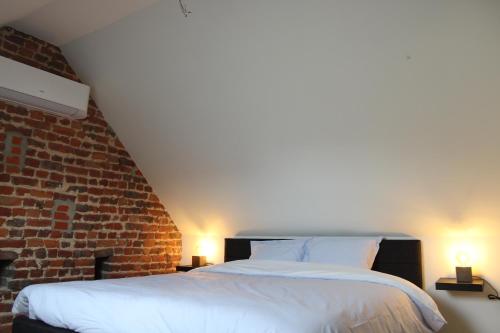 Säng eller sängar i ett rum på Gavershof