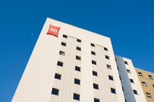 a building with the lvs sign on it at ibis Birmingham Airport Terminal Building - NEC in Bickenhill