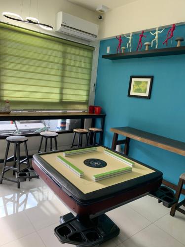 a room with a table with a cake on it at Duke 369 in Donggang