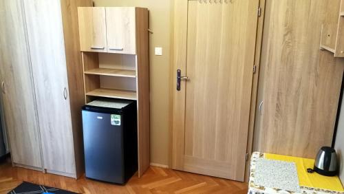 Kuchyň nebo kuchyňský kout v ubytování Tanie Noclegi Mieszkanka