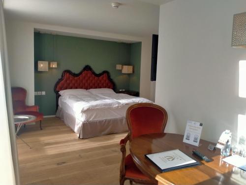Hotel Meierhof tesisinde bir odada yatak veya yataklar